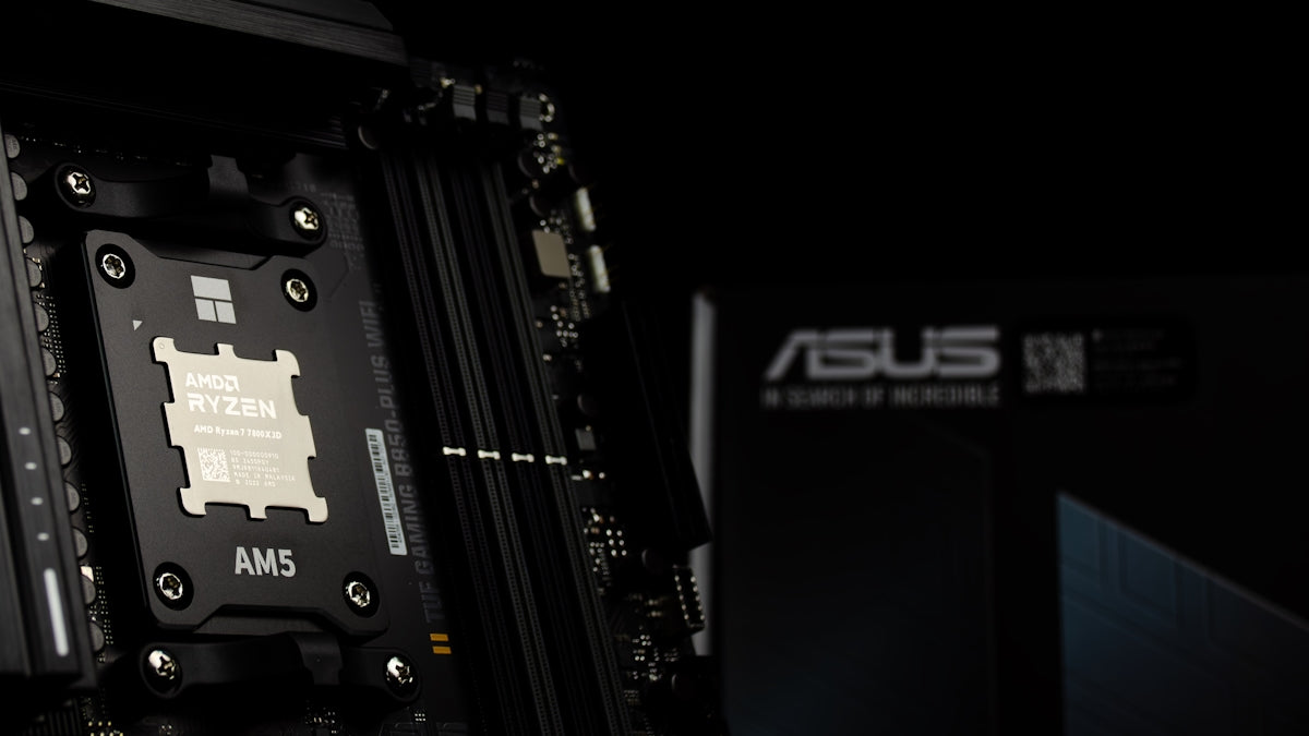 A close-up of an asus computer motherboard.